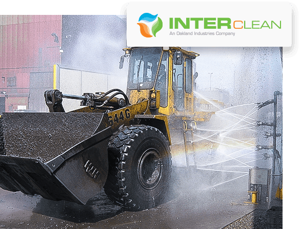 Front loader driving through an InterClean wash system