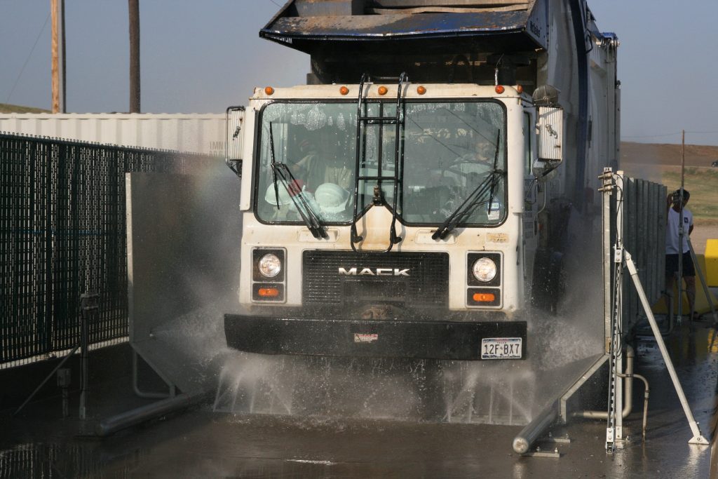 Municipal vehicle being washed