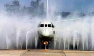 Aircraft bottom half being rinsed by wash system