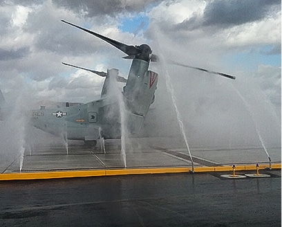 Aircraft being rinsed with wash system