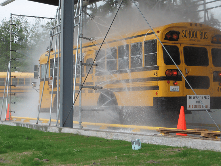 A bus being washed by an InterClean wash system.