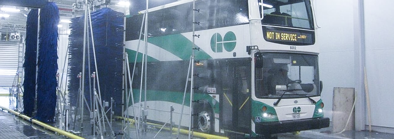 A bus going through an InterClean bus wash system.