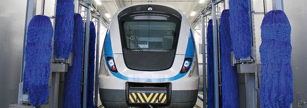 A train being washed by an InterClean train wash system.
